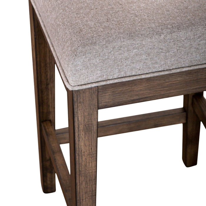 Arrowcreek Upholstered Console Stool in Weathered Stone